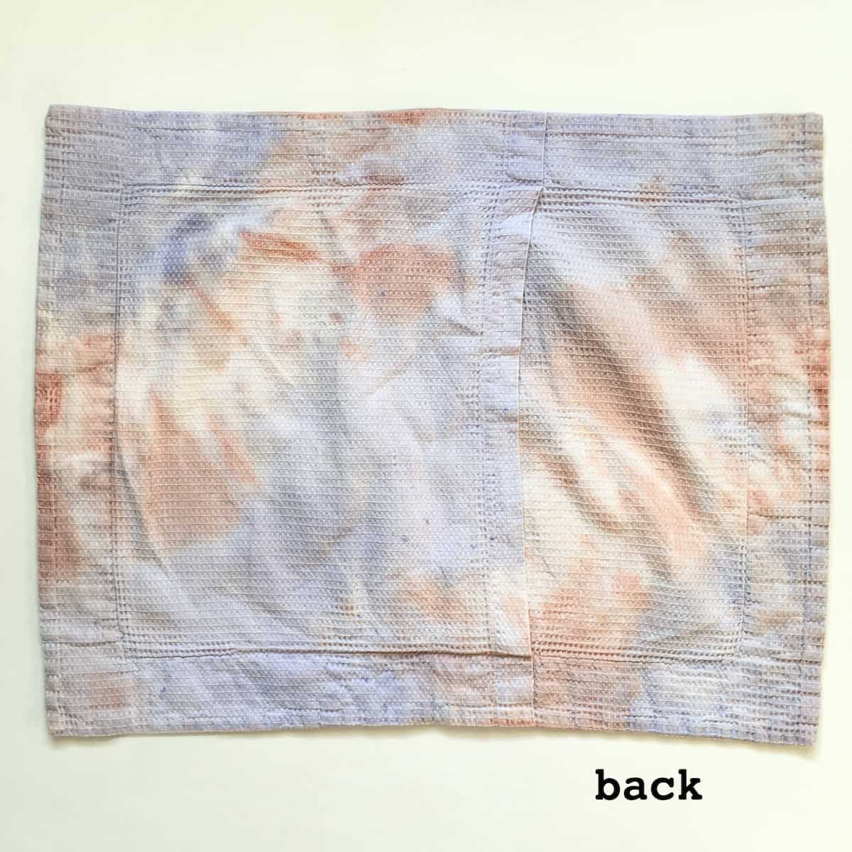 Small decorative pillowcase tie dyed with natural earth pigments