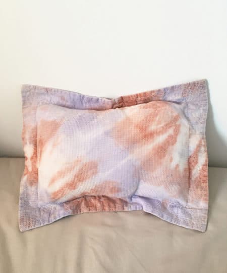 Small decorative pillowcase tie dyed with natural earth pigments