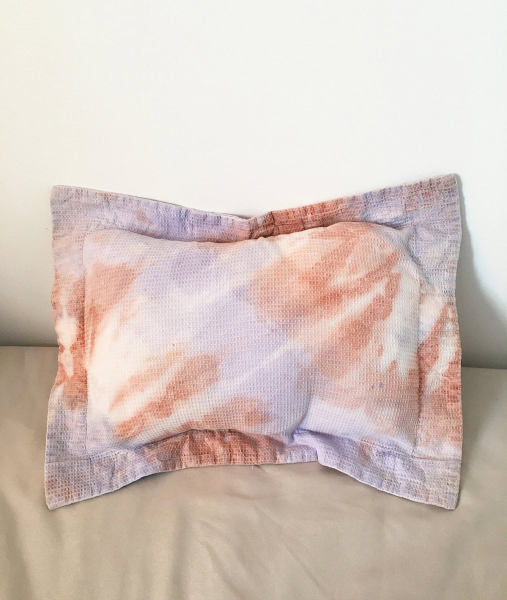 Small decorative pillowcase tie dyed with natural earth pigments