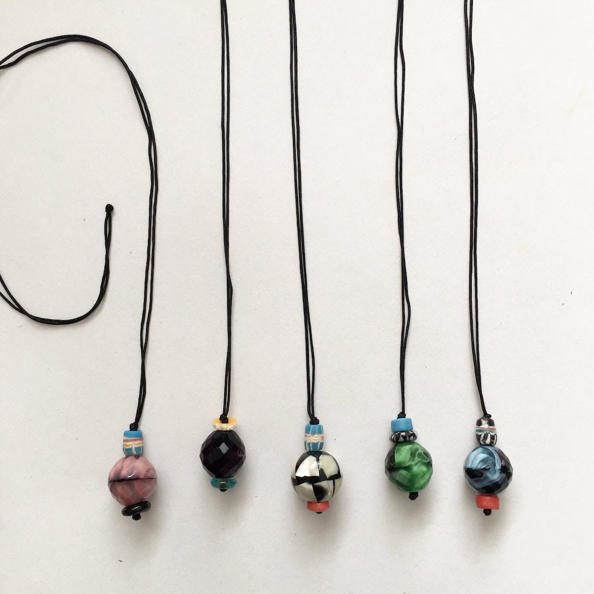 Long necklaces w marbled glass pendants & recycled glass beads