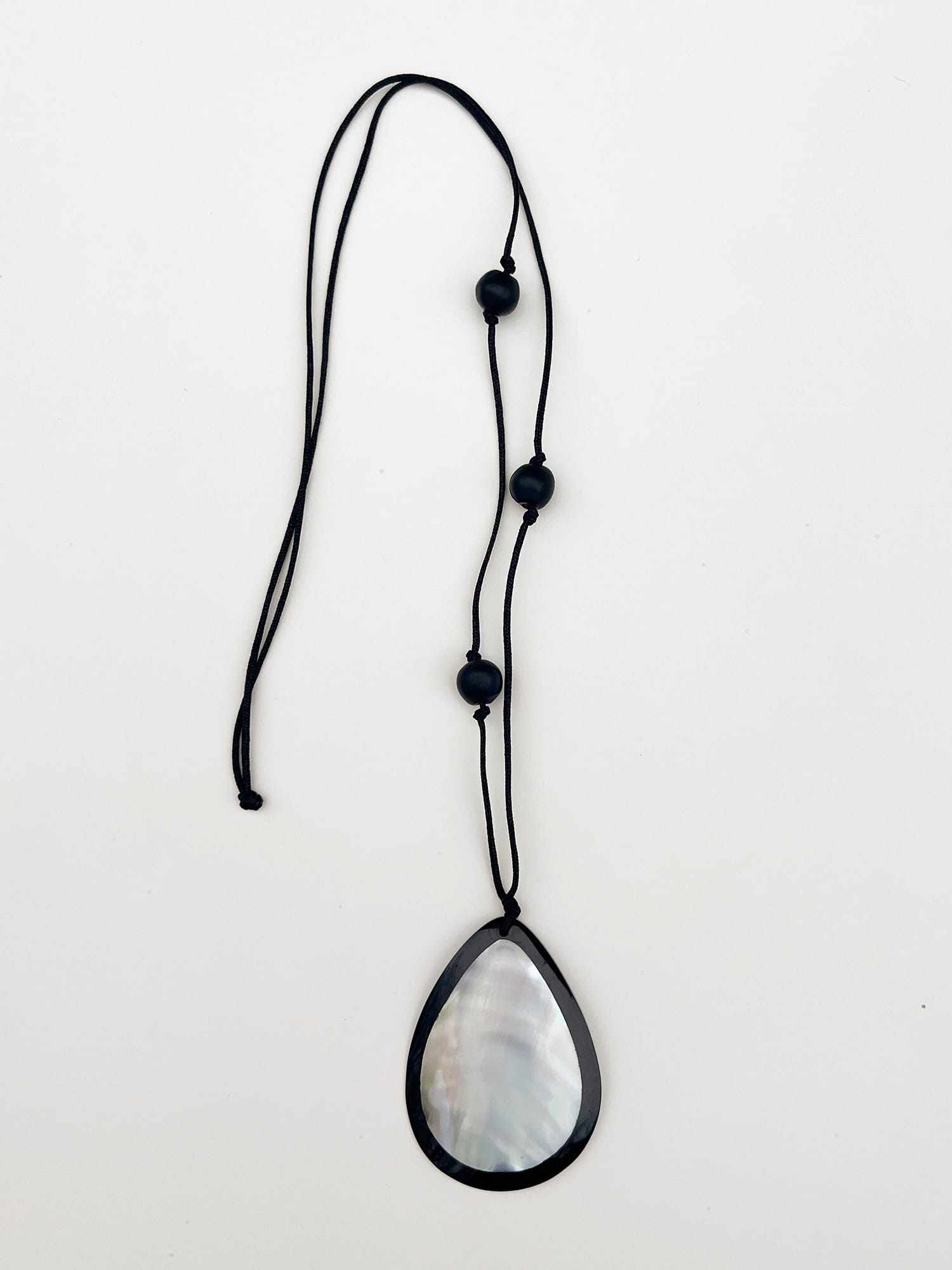 Long necklace with second hand shell pendants