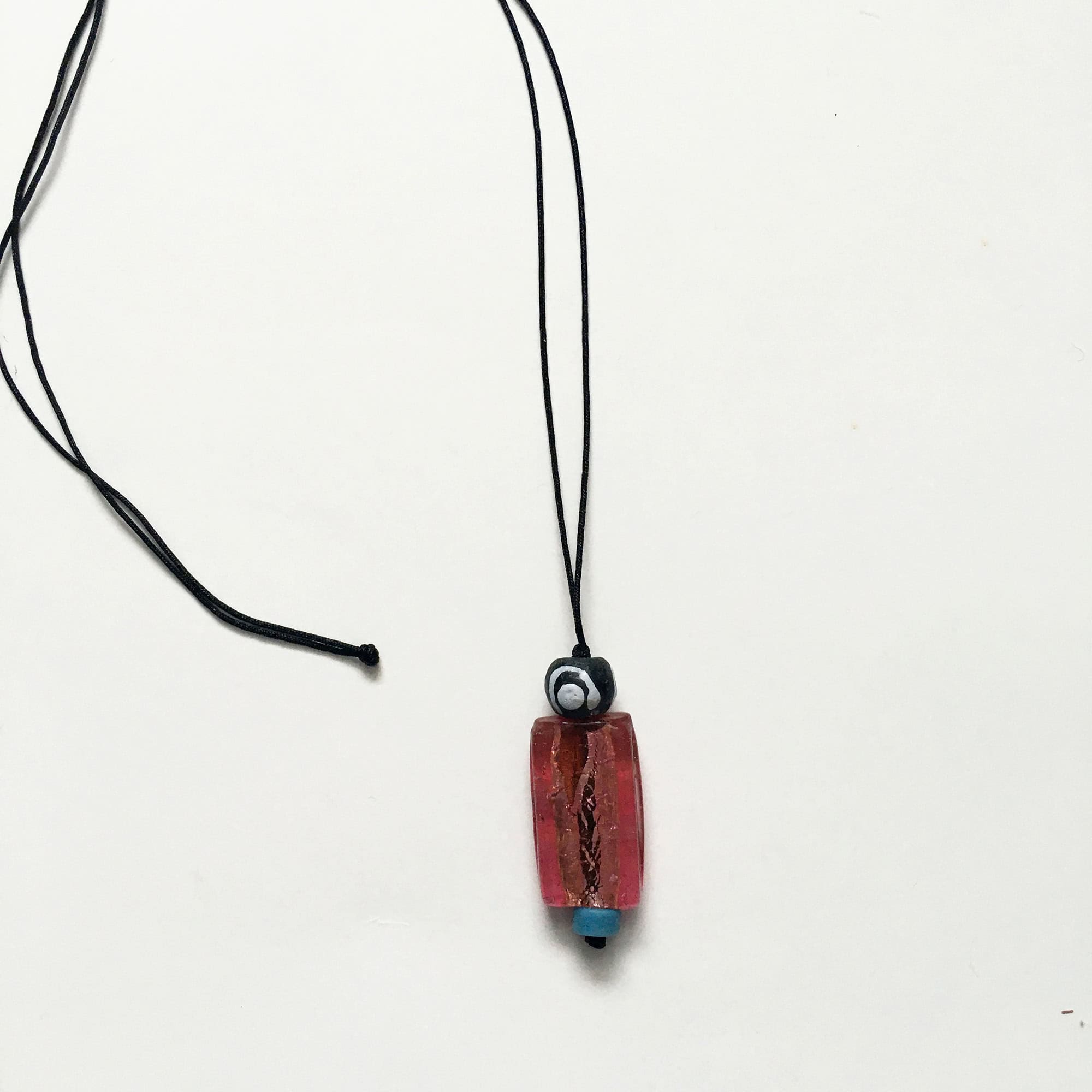 Long necklaces with repurposed pendants, and recycled glass beads