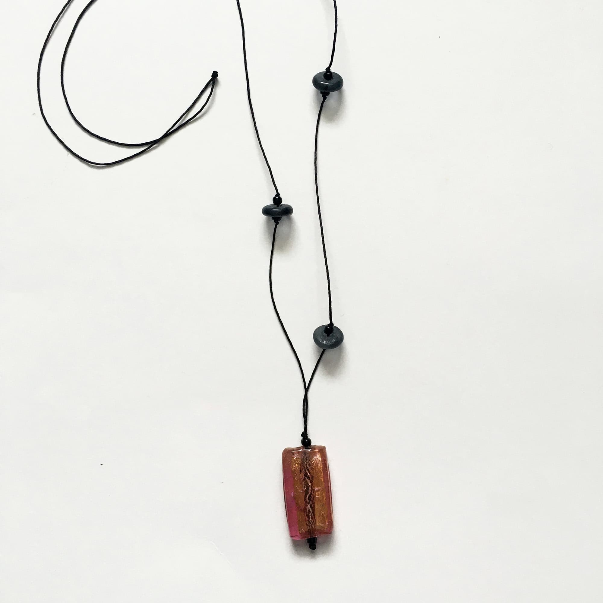 Long necklaces with repurposed pendants, and recycled glass beads