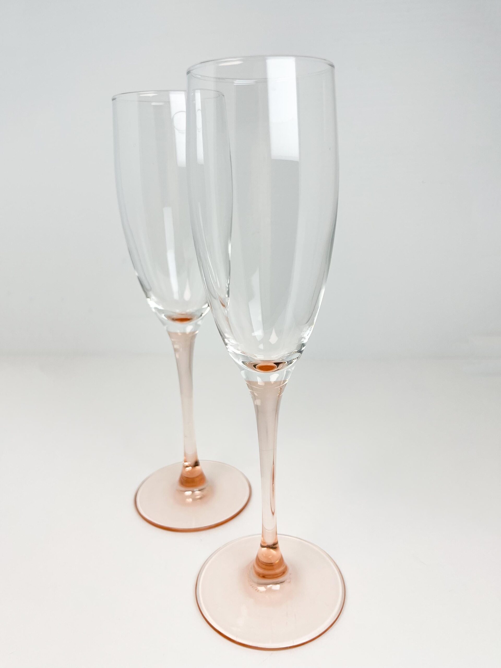 Set of 2 vintage 80s pink stem champagne flutes by Luminarc