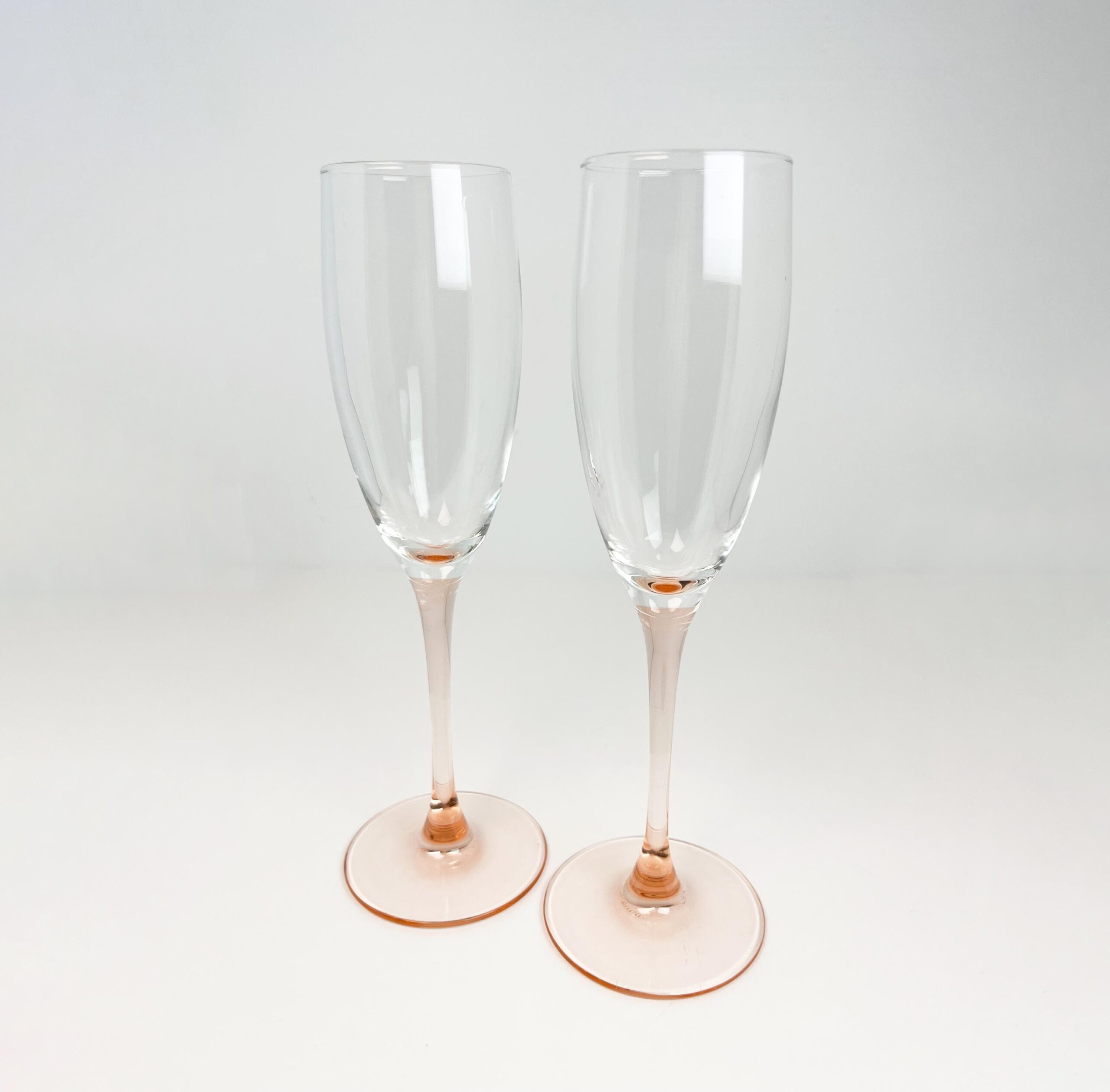 Set of 2 vintage 80s pink stem champagne flutes by Luminarc