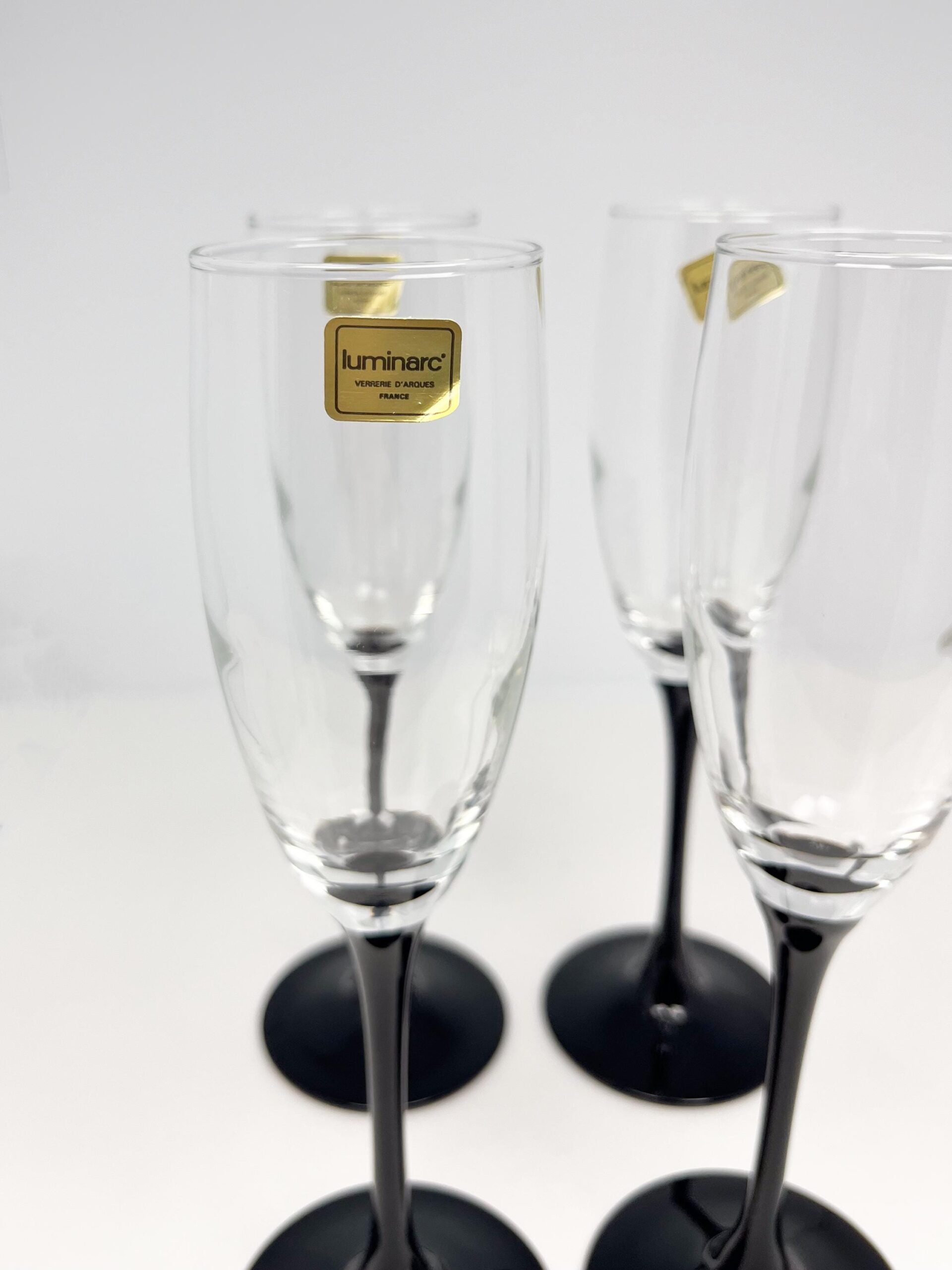 Set of 4 vintage black stem champagne flutes by Luminarc