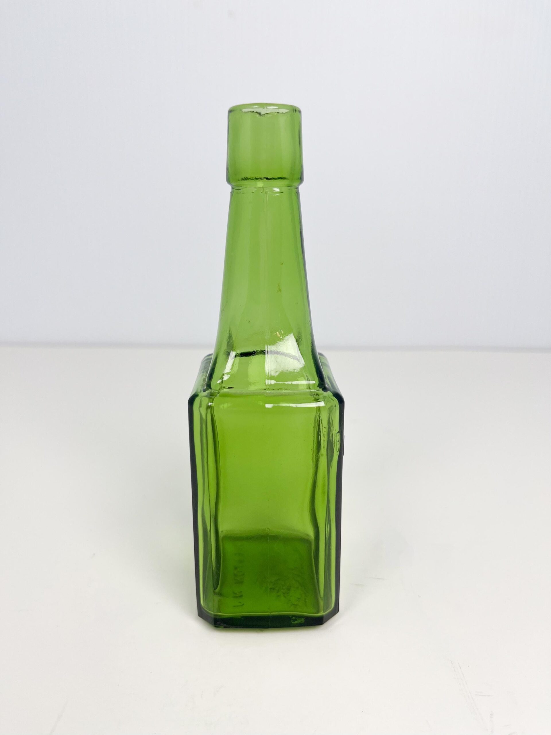 Vintage 6" Wheaton green glass bitters bottle - 60s reproduction