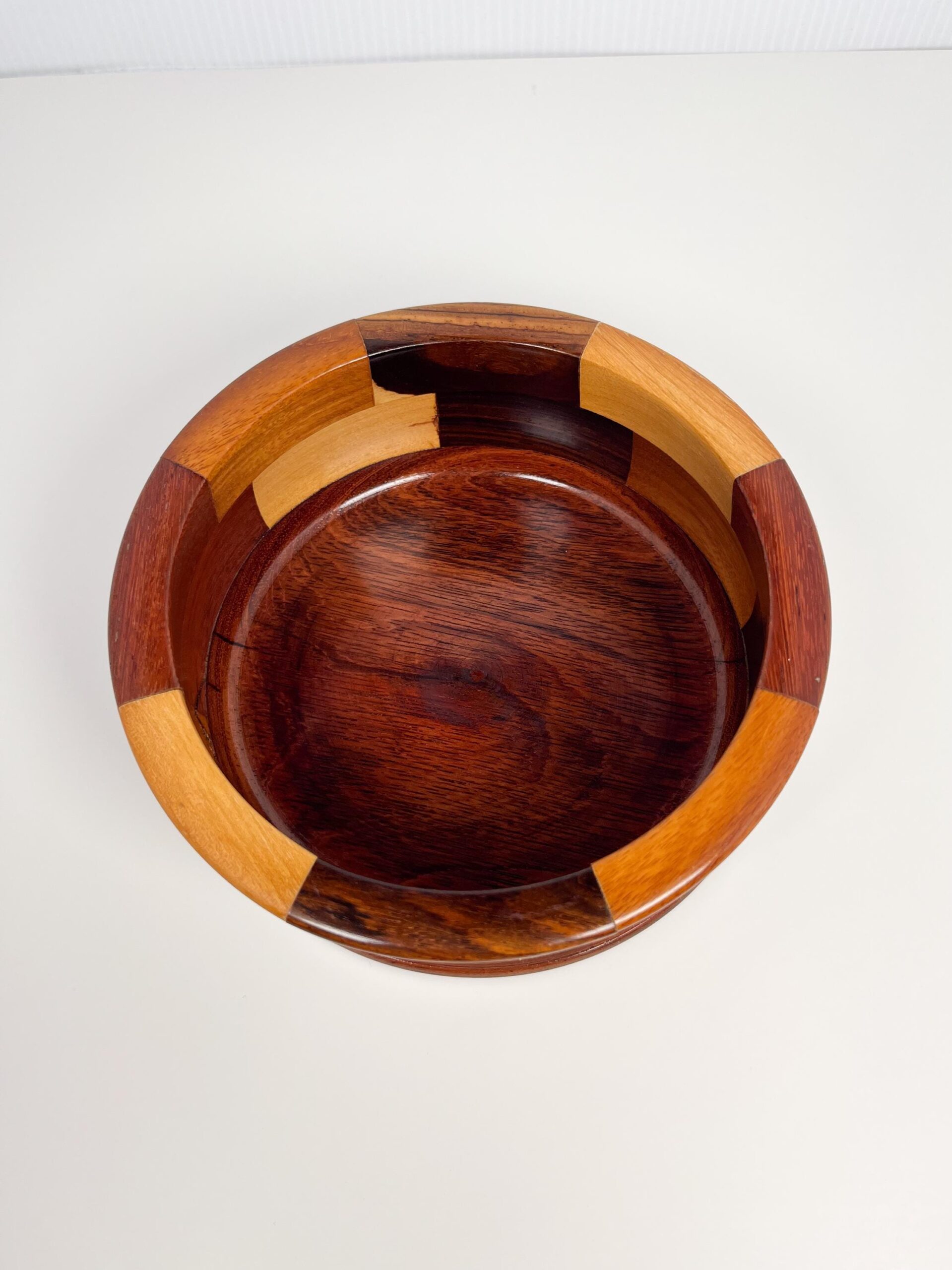 Decorative wood bowl with geometric mosaic panels