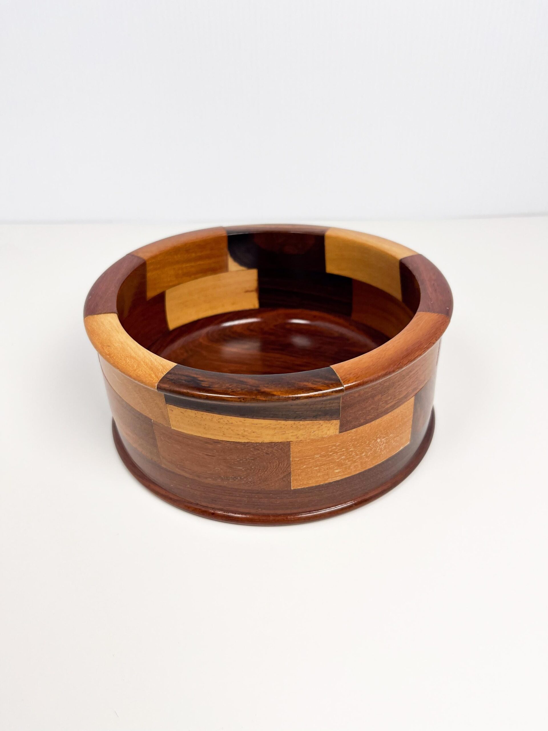 Decorative wood bowl with geometric mosaic panels