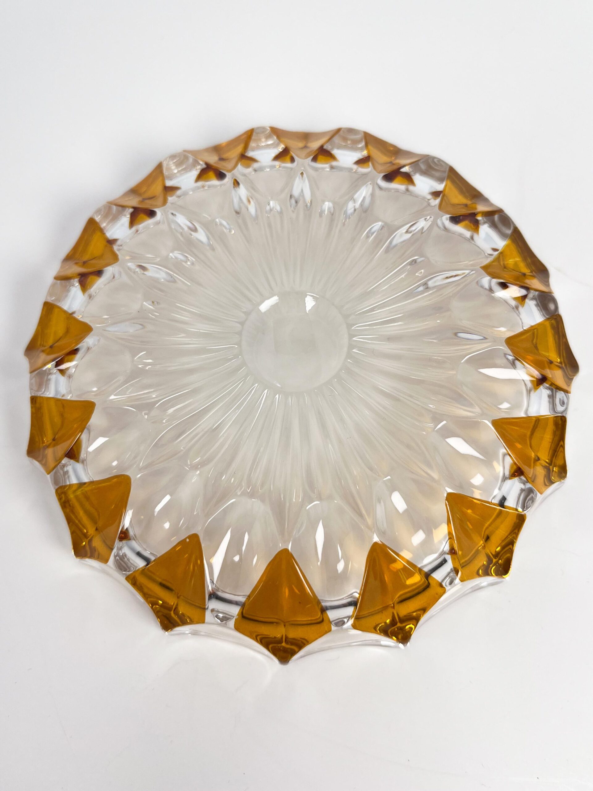 Vintage faceted crystal ashtray with amber coloured diamond motif
