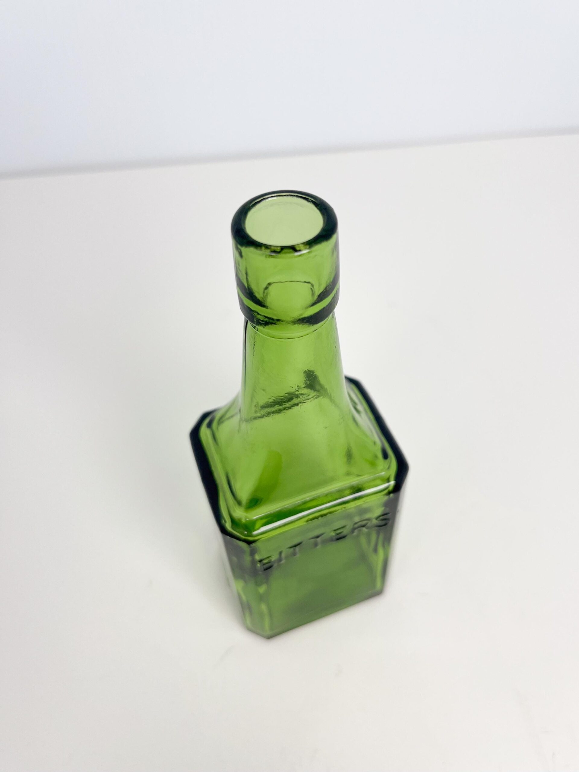 Vintage 6" Wheaton green glass bitters bottle - 60s reproduction