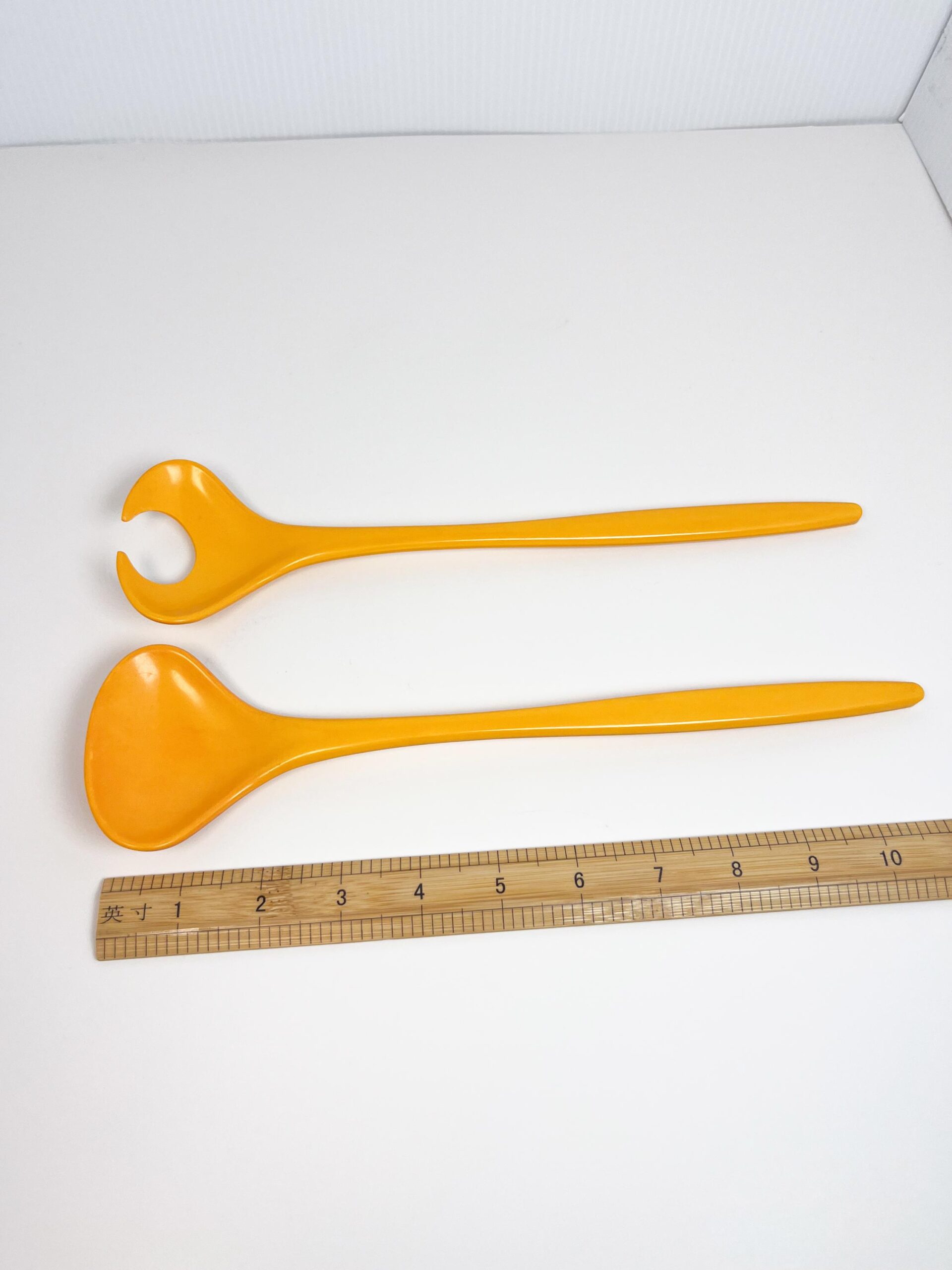 Mepal Melamine yellow-orange serving spoons by Rosti