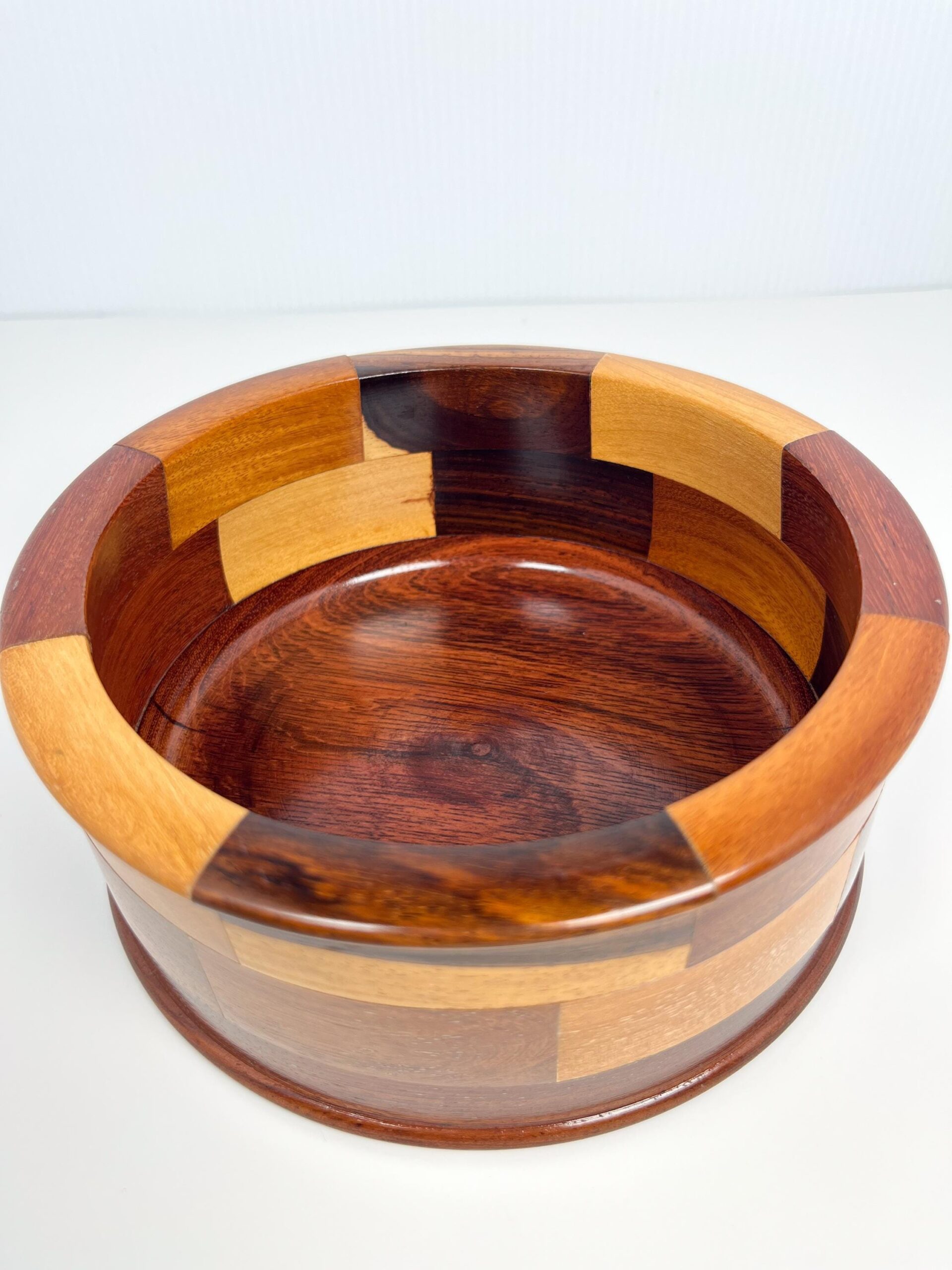 Decorative wood bowl with geometric mosaic panels