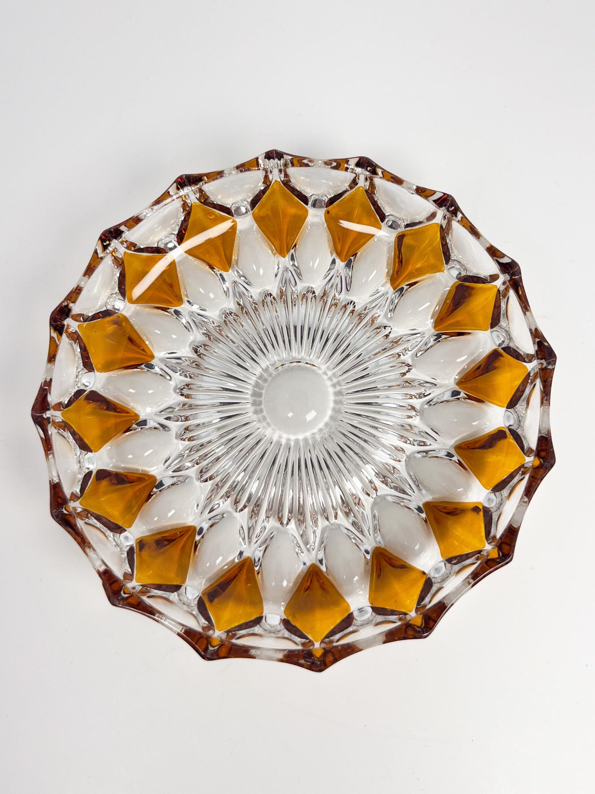 Vintage faceted crystal ashtray with amber coloured diamond motif