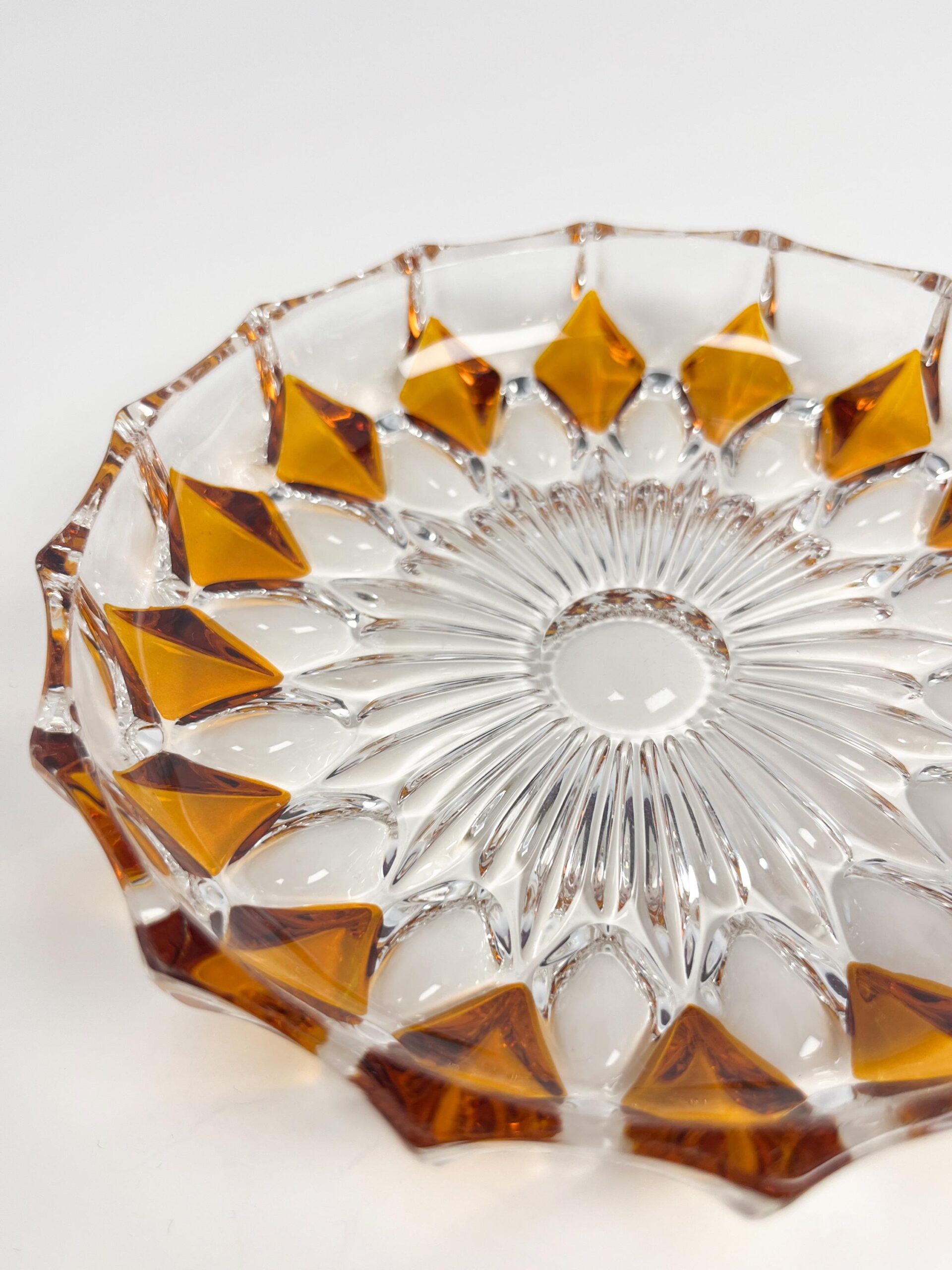 Vintage faceted crystal ashtray with amber coloured diamond motif