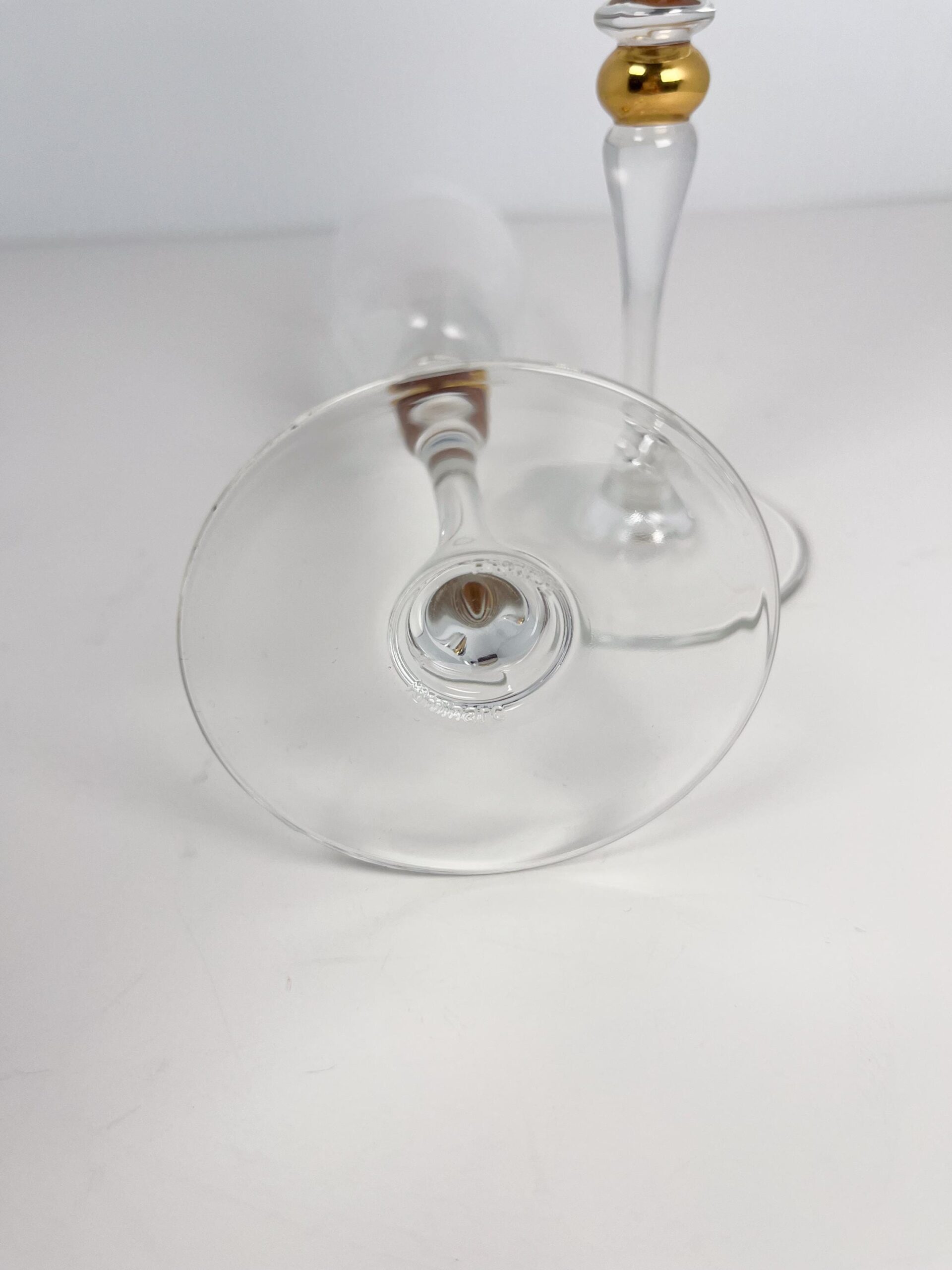 Set of 2 vintage crystal champagne flutes by Luminarc with gold decor on stem