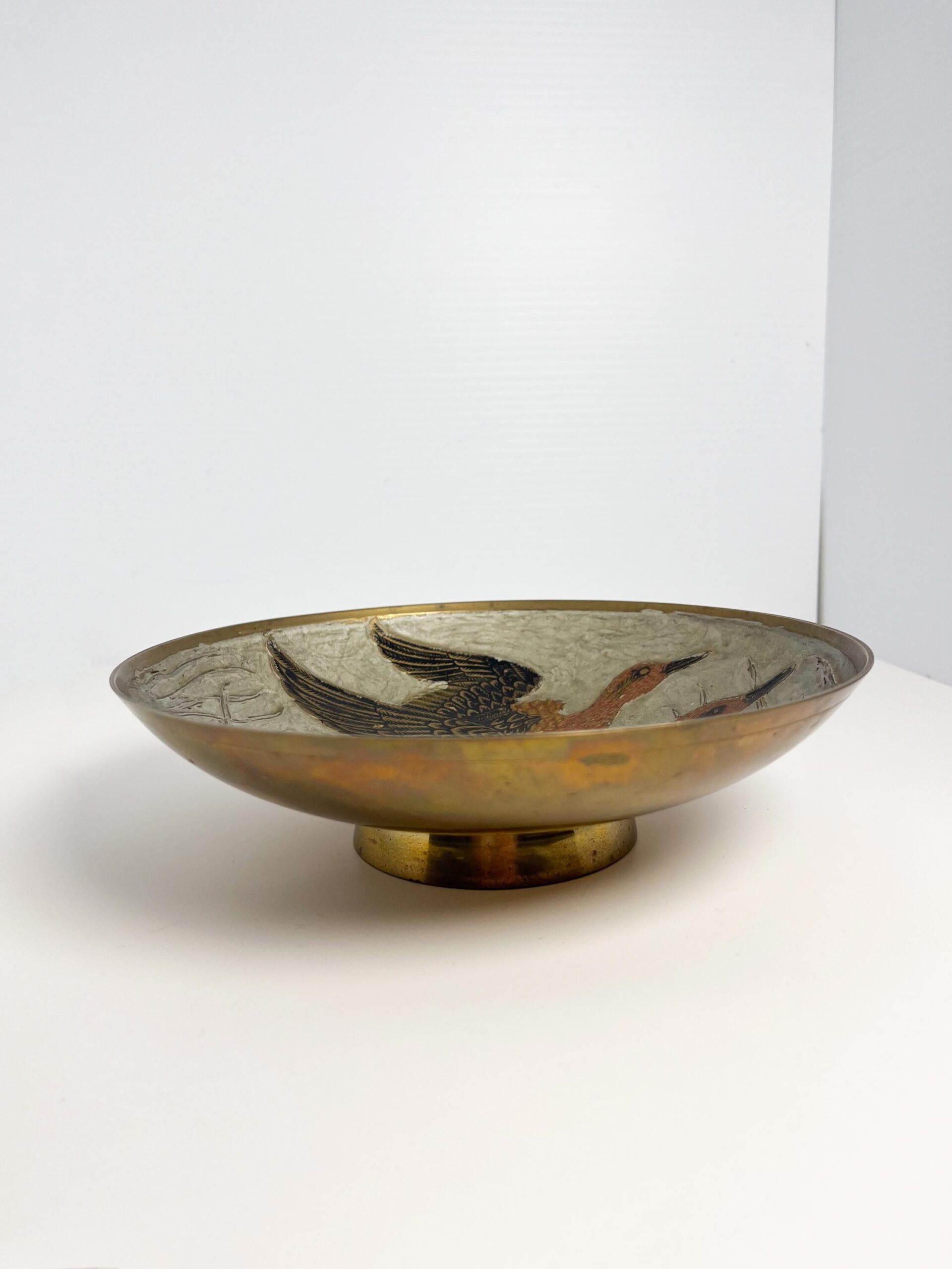 Vintage brass decorative bowl with enamel duck motif