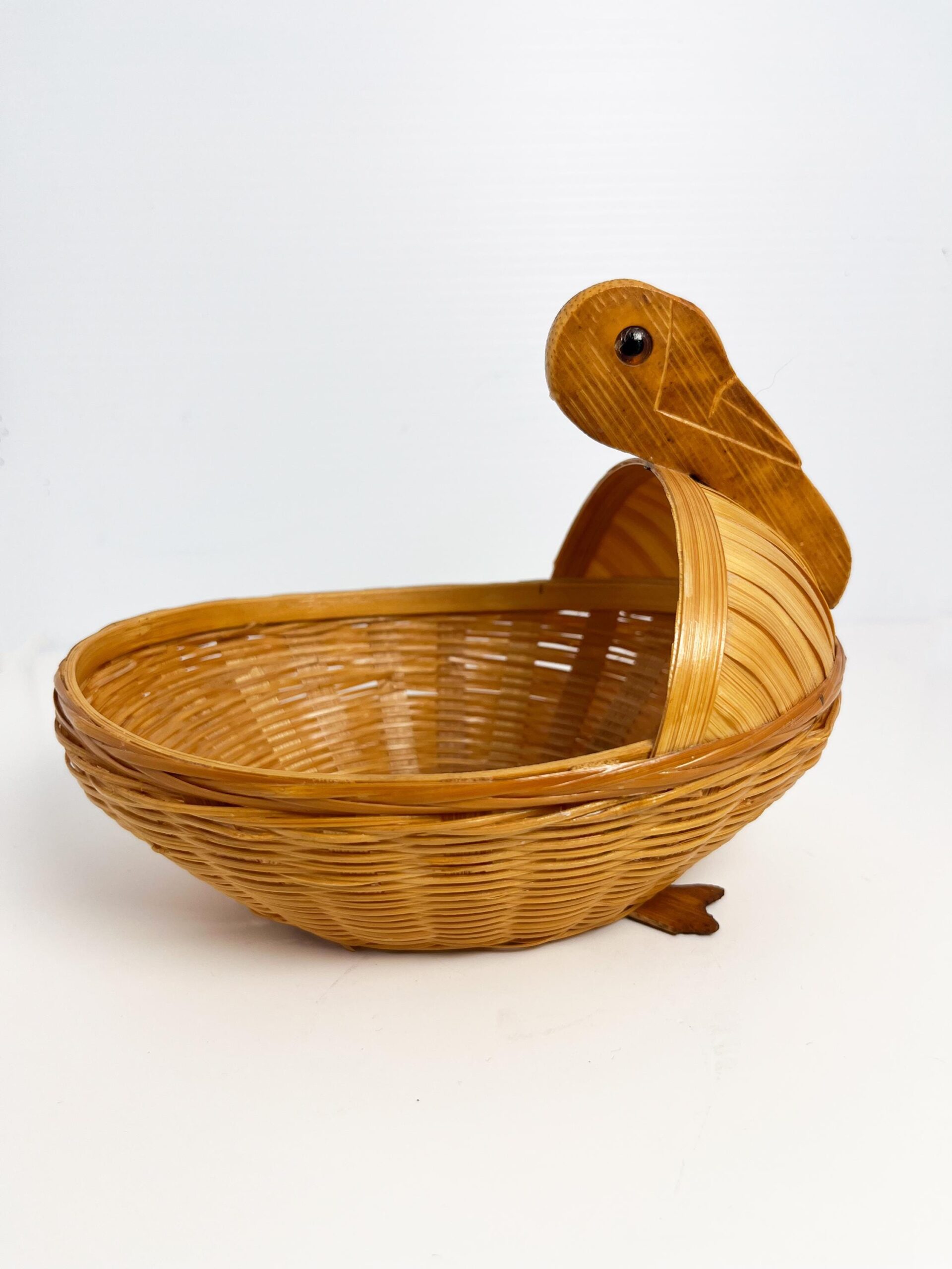 Vintage small wicker duck basket
