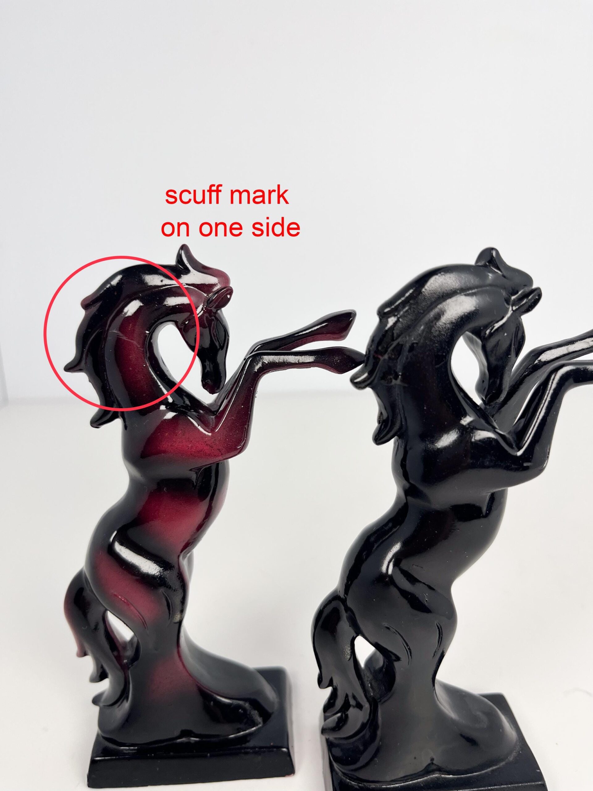 Vintage set of small lacquered horses