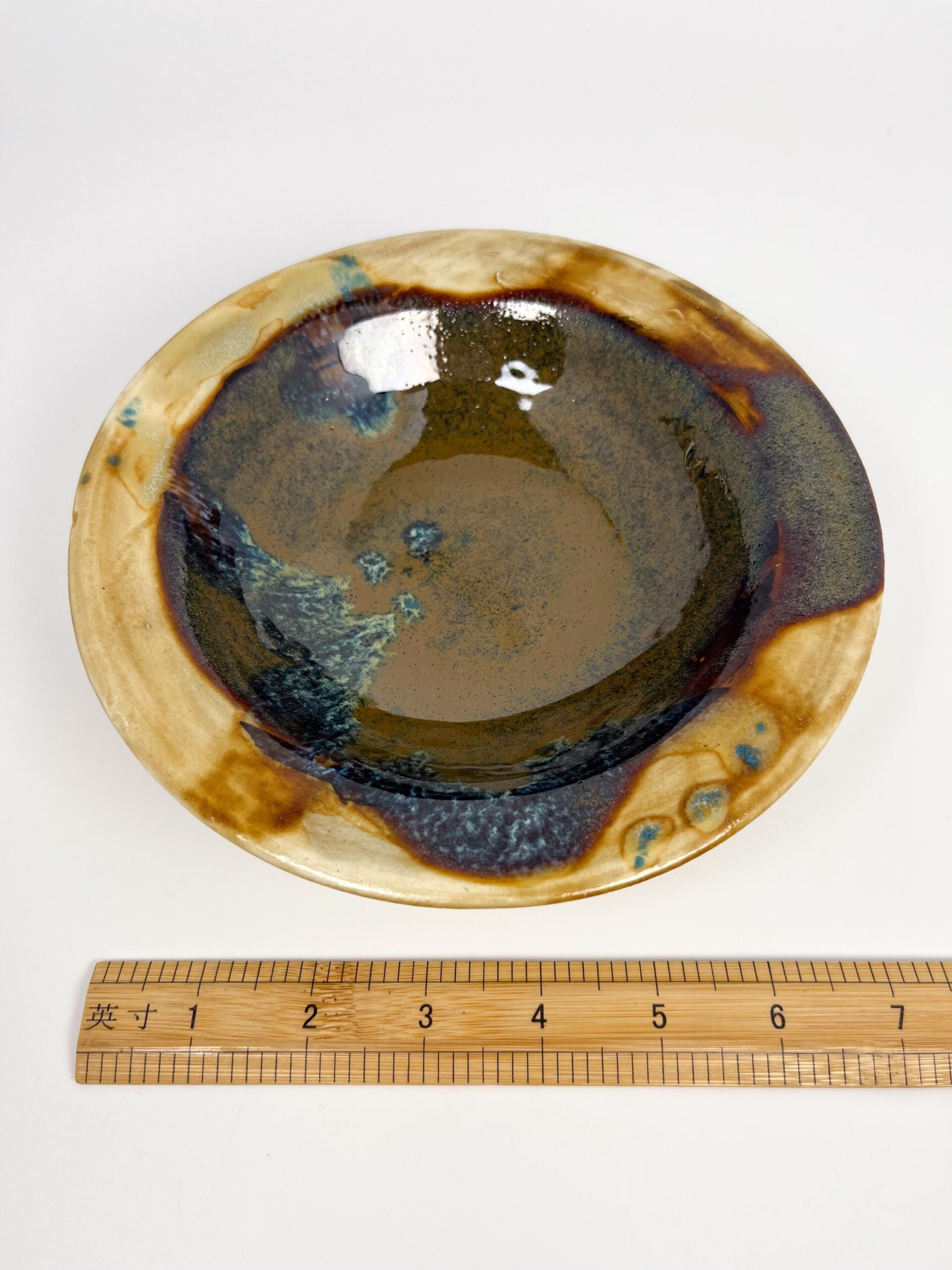 Hand thrown raku ceramic bowl - decorative studio pottery dish